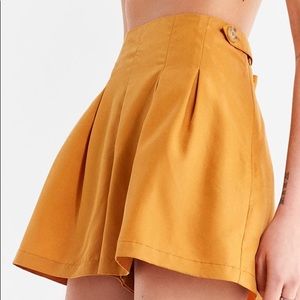 Yellow pleated shorts size 16